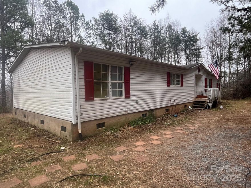 Investor Special! Rare Opportunity! Bring your vision to this spacious doublewide sitting on just over 2 acres of land. Packed with potential, this property is perfect for investors or savvy renovators looking to add value. Enjoy a prime location just minutes from Interstate 40 and Lake James. Sold as-is and cash only—don’t miss this chance to turn opportunity into profit!