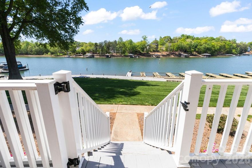 Tucked along the shores of Lake Norman, this townhome offers an easy, low-maintenance way to enjoy lake living, whether as a full-time residence or a weekend retreat. Enjoy peaceful mornings on the back deck, afternoons on the water, and evenings fishing off the dock. Inside, the open floor plan flows seamlessly to the outdoor living space, with a sliding glass door and wet bar that make entertaining simple. Upstairs, two spacious bedrooms each feature their own en-suite bathroom, offering comfort and privacy for owners and guests alike. A short walk down the dock leads to your boat slip with lift and jet ski lift, making lake days effortless. With Lake Norman State Park just minutes away, you’ll have even more opportunities to enjoy the outdoors.