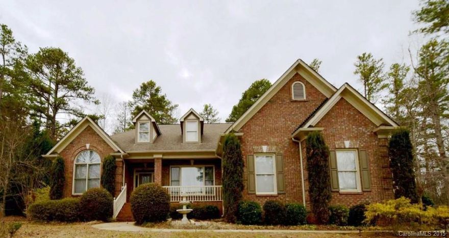 All Brick Ranch Home! Entry w/gleaming hardwoods-lead to DR with trey ceiling. French doors off foyer lead to  LR/Office. Family Room w/gas fireplace, built-ins w/media niche, ceiling fan. Kitchen w/eat-in bar, granite countertops, pendant lighting, built-in microwave, adj breakfast area. MBR has trey ceiling, ceiling fan, 2 walk-in closets, bath w/tile floor, garden tub & sep shwr. Covered brick patio overlooks wooded & private back yard. 2 car side load garage. 1 Year Home Warranty incl.