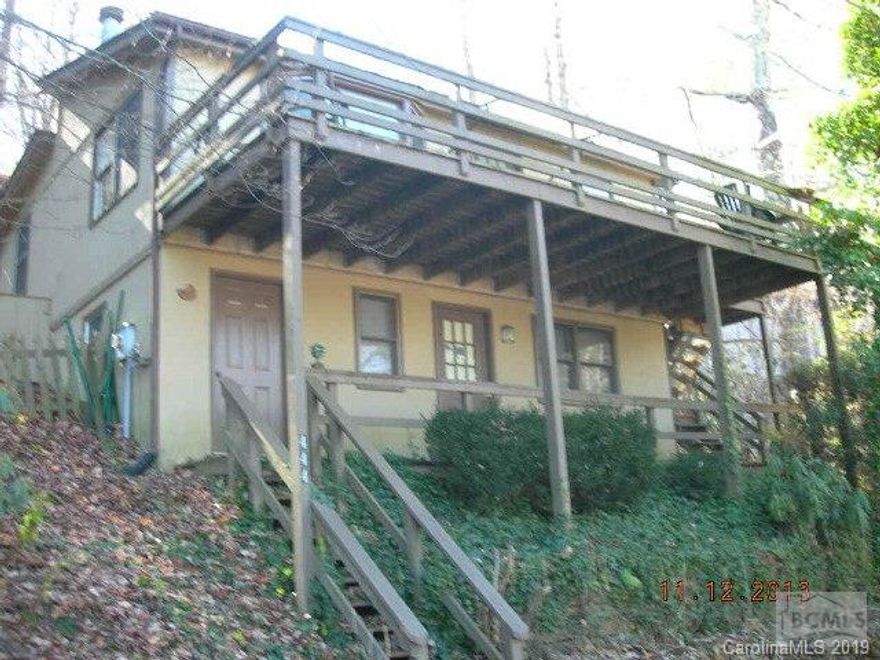 Bank owned property in need of some updating but great location within minutes to Banner Elk, Valle Crucis and Boone.  Home has one bedroom and one bath on lower level with an additional bonus room.  A set of stairs leads to upper level with another bedroom and full bath.  Open kitchen and living room with nice fireplace and access to front porch overlooking mountains.  Sold AS-IS.  Buyer addendum to follow acceptance.
