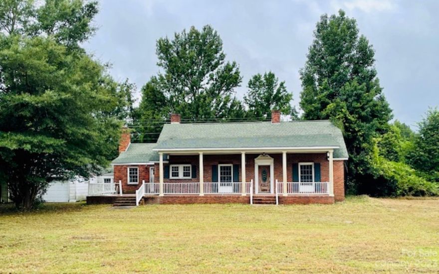 FIXER-UPPERS DREAM WITH VISION. Looking for lots of room/space in a home that still allows you to customize your way? Home's unfinished, NOT MOVE-IN READY, painted/cleaned up throughout leaving you a blank slate for customization/final touches you want. Approx 1600 sq ft w/ large master bedroom & guest bedroom w/big front/formal living room, den/family room (separate entrance), spacious kitchen area, formal dining area plus lots of porch/patio areas. Hardwood floors throughout.  Unfinished bathroom has a large walk-in shower. HOME SOLD AS-IS. 2-car garage connected by covered foyer/mudroom and cellar-type basement area accessed from the back patio. Pull down stairs lead to large attic where new HVAC ductwork is evident. You have to see this home to appreciate it. Easy driving access to Charlotte(1hour) and the beach(less than 2)  Call NOW to schedule an appt to see this home.