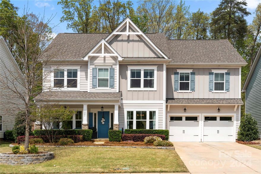 Welcome to the vibrant community of Handsmill on Lake Wylie! This impeccably maintained home shows like a model boasting 4 large bedrooms, 3.5 baths, and a generously-sized bonus/flex room. The gourmet kitchen is a culinary dream, featuring quartz countertops, expansive island, gas cooktop, wall oven and microwave, tile backsplash, butler's pantry, and custom cabinetry. Luxurious upgrades include premium vinyl plank flooring, ceramic tile, lighting and fixtures, and elegant moldings. Primary bedroom retreat offers a lavish bath, with dual vanities, spacious walk-in closet, garden tub, and separate shower. 3 additional bedrooms and a bonus/flex room, provide ample space for guests. Nestled within a gated community, with a pool, clubhouse, and scenic walking trails. Step outside to the screened porch and discover a backyard oasis, featuring mature trees, a pergola, and an oversized patio perfect for entertaining. Convenient to Charlotte and minutes from airport. SHOWS like NEW!