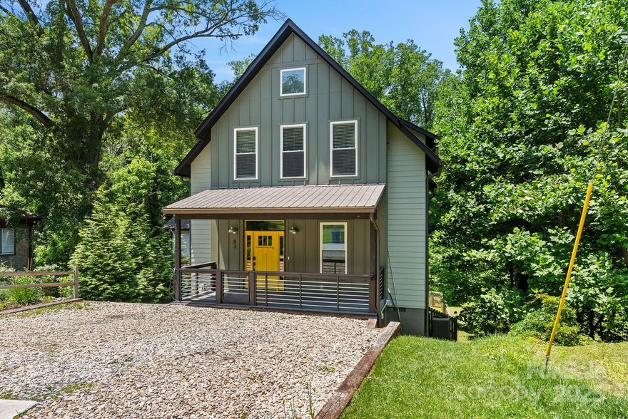 Rusafova/Markulis designed and Energy Star Certified, this home offers living across three levels. 83 Talmadge Lane sits on a quiet, dead-end street and is filled with natural light and peaceful energy. Freshly painted with 5 bedrooms, 4 bathrooms, 3 covered porches, and a thoughtfully designed floor plan, the home blends form and function.The main level is open and inviting, featuring a bright sitting room, a full guest bedroom and bath, a chef’s kitchen with a butler’s pantry and bar, and a large living room that’s perfect for entertaining or relaxing.Upstairs, the spacious primary suite feels like a retreat with a spa-inspired bathroom complete with a floating double vanity, soaking tub, and walk-in shower. The lower level offers flexible living space-ideal as a guest suite, home office, or second living quarters-accessed via the interior stairs or directly from the gently sloping side yard and lower deck. Enjoy easy access to both Haywood Rd and West Asheville Park. 3 EV chargers