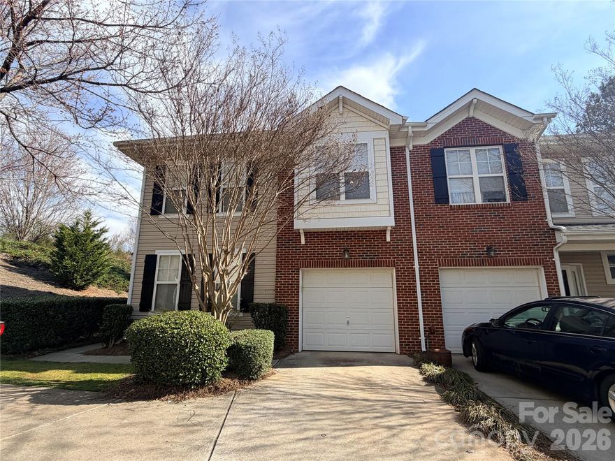 Private end-unit townhome with a one-car garage and three additional parking spaces in the highly desirable Ballantyne area. This spacious home features an open floor plan with a stunning two-story dining room. Luxury vinyl plank and tile flooring run throughout the entire home. The upgraded kitchen boasts granite countertops, and the great room offers a cozy gas log fireplace. Large bedrooms feature vaulted ceilings, and the primary suite includes a walk-in closet off the master bath. Located in a top-rated school district and a prime location just minutes from shopping, dining, schools, and easy access to I-485.