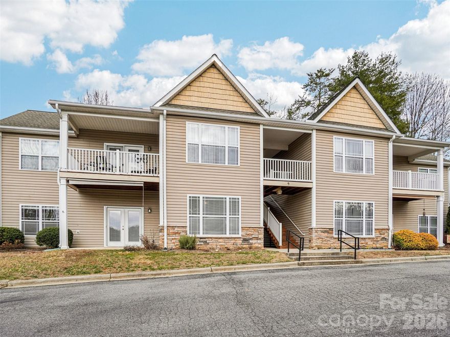 Welcome to your new, move-in-ready condo in Asheville! Enjoy the convenience of main-level, maintenance free living at an affordable price in this small, quiet community on the North side of town. This inviting condo features high ceilings, a spacious living room, and abundant natural light from ample windows. Step out onto your private patio and enjoy a relaxing outdoor space. The updated kitchen boasts stylish cabinets, granite countertops, and a new dishwasher. A separate laundry room includes a new washer and dryer (2025).Excellent location, offering quick access to charming downtown Weaverville's Main Street shopping, and just a ten-minute drive to downtown Asheville.