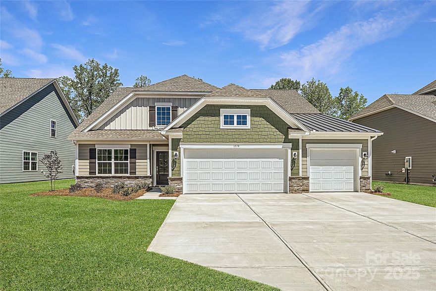 This expansive Holden floorplan is a single-family home made for lavish comfort and entertainment with a gracious layout spread throughout two levels. On the first floor is a formal living room and an open-plan layout shared between the main living and dining spaces, along with a covered patio for outdoor activities. On the same level is a secondary bedroom and a lavish owner’s suite with an attached bathroom. The top floor presents a sprawling loft and a third bedroom. Options for upgrade include: a study in lieu of a flex room. Plus, our signature Everything's Included program means you will get a gourmet kitchen with double ovens and cooktop, quartz or granite kitchen countertops, subway tile backsplash, ceramic tile, luxury vinyl plank flooring, and a gas fireplace (per plan) at no extra cost! Harris Mill located in a sought-after Indian Land, offers luxury homes and quarter acre and wooded homesites.