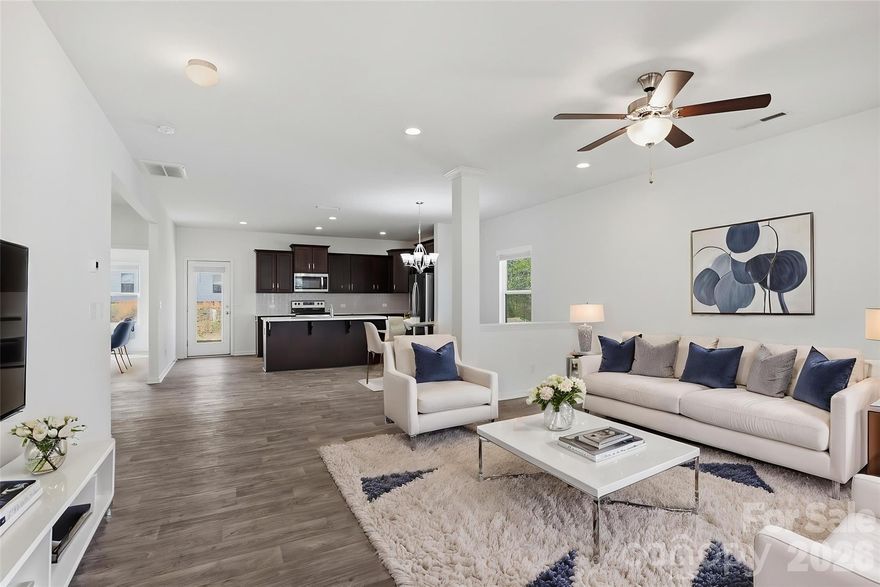 This move-in-ready 4-bedroom, 3-bathroom home at 4225 Stockbrook Dr. is an ideal choice for families looking for a functional and well-connected space in Charlotte, NC. Built in 2020, the 2,100-square-foot interior centers around an open-concept living area and a well equipped kitchen with stone countertops and walk-in pantry. Buyers will appreciate the spacious primary suite with its own walk-in closet, while the three additional bedrooms offer flexibility for children's rooms or a home office. Practical updates like energy-efficient central air and a modern heat pump ensure the home remains comfortable and cost-effective through every season. Outdoor living is easy here, with a private backyard for hosting neighborhood BBQs. The home is just minutes away from Reedy Creek Nature Preserve, a massive 737-acre destination featuring playgrounds, hiking trails, a dog park, and fishing spots. With quick 3-minute access to I-485 and local grocery stores nearby, this home balances quiet residential life with the convenience of a short commute