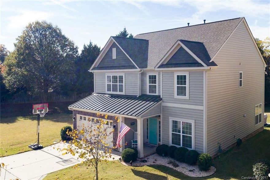 Spacious and Meticulously well maintained home in the heart of Ballantyne! Carefree living w/yard maintenance included! Enjoy the outdoor on the largest level lot or the extended patio. Storage Shed has AC & Light capability. Walking distance to Award Winning Schools or Sports complex across the street. Open Flr Plan filled w/Natural Light! Bdr w/full bath on Main is perfect for a Mother in law suite. Huge Loft has its own Walk in closet. Master Suite boast of tray ceiling & a massive closet.