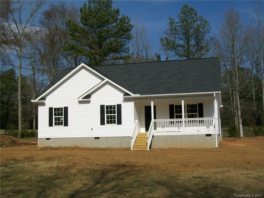 New construction with large Great room with vaulted ceiling, eat in kitchen.  master with trey ceiling.  Hardwoods int he living areas, carpet in Bedrooms.  Granite counter tops in kitchen and both baths.  Covered rear porch.  Large lot. Outbuilding