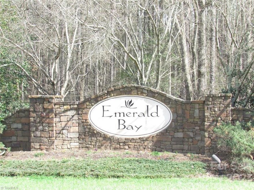 Enjoy the beauty, serenity and privacy of Emerald Bay - a great place to build your dream home and raise your family or enjoy retirement. Lot #37 consisting of .89 acre with approvals for a well and septic system already obtained through Alcoa.
The lot is located on the Panther Creek channel which is the last channel before the dam thus providing exceptional water depth at full pull of approximately twenty-four feet in mid-channel which would equate to twelve plus feet of depth at the proposed personal dock location.
A few of the outstanding attributes of this lot are:
1. Gated community for additional security
2. Paved streets
3. Underground utilities
4. Community boat ramp and dock area
5. Discrete and secure storage area for motor homes, boats and trailers