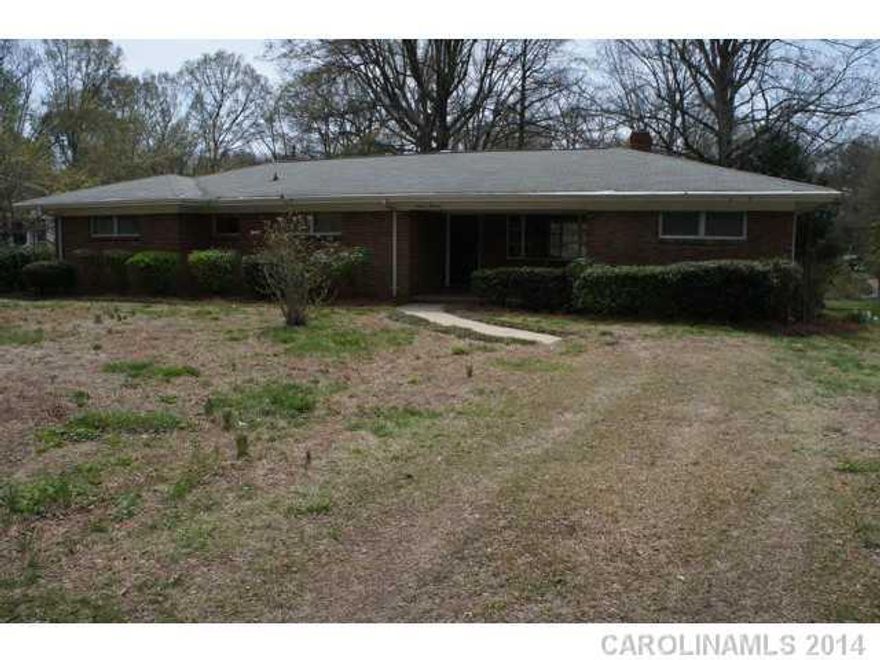 FULL BRICK RANCH home on almost 1/2 acre lot in east charlotte.  Home is FRESHLY PAINTED & has NEW CARPET.  Spacious eat-in kitchen with NEW COUNTERS, NEW SINK & RANGE/OVEN.  Large front & back yard, great for entertaining.  Shed and attached room provide lots of storage. GREAT INVESTMENT PROPERTY.