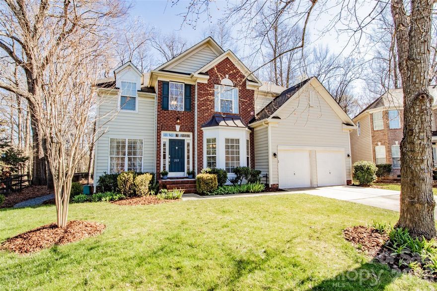 Location, Location, Location! This beautiful home, nestled on a flat wooded cul-de-sac lot, is a must-see in the highly desirable Somerset neighborhood featuring outstanding amenities and award-winning Marvin schools. The main level offers a flexible guest bedroom or home office, full bath, formal dining room, living room, and an impressive two-story great room with a gas fireplace. The gourmet kitchen features white cabinetry, stainless steel appliances, granite countertops, a large island, and two pantry closets. Hardwood floors flow throughout the first floor, while oversized windows fill the home with natural light. Upstairs, the spacious primary suite boasts a tray ceiling and is complemented by two secondary bedrooms and a versatile loft space. Relax year-round in the enclosed rear porch overlooking the private wooded backyard—perfect for entertaining or enjoying quiet evenings around the fire pit. Community amenities include a pool, playground, recreation area, and pickleball/tennis courts. Conveniently located near Blakeney, downtown Waxhaw, and south Charlotte, while benefiting from low Union County taxes.