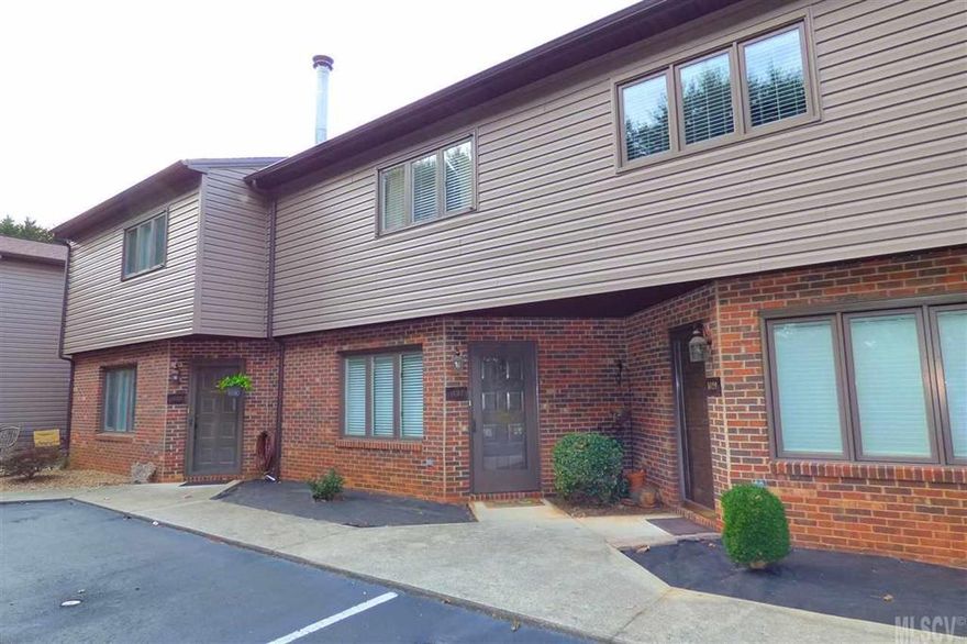 Terrific NW Hickory location for this two-bedroom, two-level condo at Lakeland Ridge! This unit has undergone extensive renovations in the last two years and now shows like a brand new unit! The main level offers an open great room with corner fireplace, wood laminate flooring, neutral colors, dining area, and convenient half bath. The all-new kitchen has new cabinetry, countertops, stainless appliances, tile floor, pantry, and a cozy breakfast area. The stairs to the 2nd level offer a landing with back door, and lead to two spacious bedrooms including a master suite with new double vanity and walk-in closet. You'll also find a second bedroom, 2nd full bath, and laundry closet upstairs. HOA Dues: $130/month, and include water, sewer, trash, and exterior yard and building maintenance. Located within walking distance to Glenn Hilton Park, Jaycee Park, Rotary Park, & Geitner Park, including the greenway, Lake Hickory, tennis courts & baseball fields.