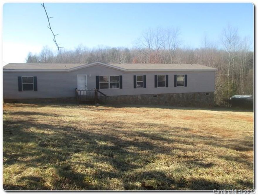 Beautiful Country doublewide in Maiden! Home sits on almost 3/4 Acre lot with large deck for entertaining. Home's interior is spacious and open with large rooms and tons of natural light. Kitchen is expansive with plenty of cabinet space.