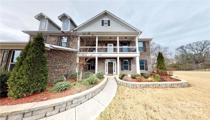 Remarkable 6 bedroom/4.5 bath home zoned for Weddington schools. Gorgeous finishes in the upscale chef's kitchen, hardwoods throughout the main living area, and custom details throughout this spacious home. Main floor boasts an oversized great room with fire place, kitchen island, dual pantries, dining room, office and bedroom with full bath attached. Retreat to the second floor master bedroom with an incredible custom closet fit for a queen. A bonus room flex space can be used for gaming, movie night or a great place to chill. Gated community, private cul-de-sac location, over an acre of land, and 3-car oversized garage. Located away from it all yet so close to modern conveniences. 5 minutes to schools, 10 minutes to shopping and dining at Waverly, and a quick hop onto I-485. Won't last long!