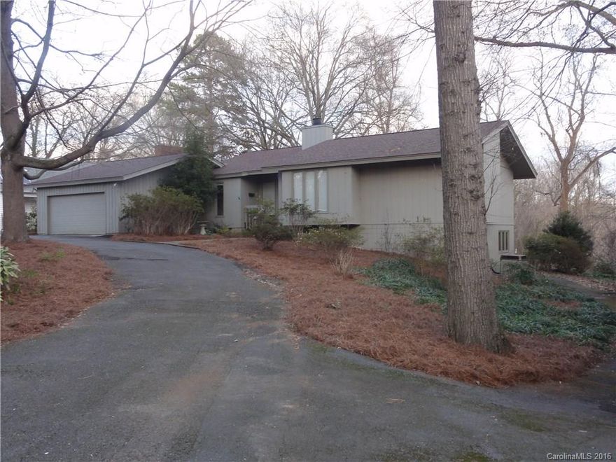 Fantastic opportunity to live in Myers Park. Hard to find .64 acre lot. Home features an open floor plan, updated kitchen with granite counters, new cabinets and stainless appliances.  Spacious deck overlooks the large private backyard and a small pond on adjoining property.  Heated and cooled basement would make a great office or recreation room. Two Car Garage. Willow Oak Rd has a rural country feel and is only a short walk to the Greenway or Freedom Park. Top rated Myers Park Schools.