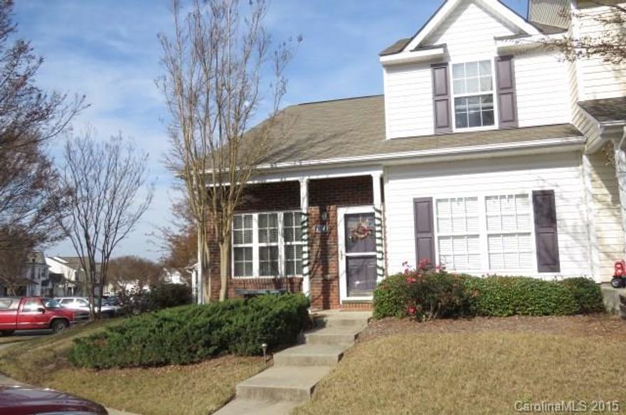 Great location within a sought after Ft. Mill townhome community! 3 BR end unit w/ master BR on main. New carpet upstairs, laminate wood on main. Butcher block top island, newly painted cabinets, fenced patio area & custom chalkboard wall in kitchen.  Gas cooktop and fireplace. Great location with easy access to I-77, Ballantyne area and the airport, with the added advantage of low York Co. taxes. Private entrance for residents only accessible from Hwy. 51.