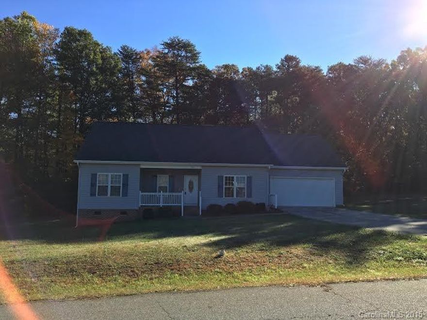 Quality built ranch home conveniently located to I77 and shopping.  Home features include split bedroom plan, vaulted ceiling in living area, galley kitchen, expansive back deck overlooking private back yard, two car garage.  Home has been freshly painted both inside and out.  Easy to show.  Come and see!!!