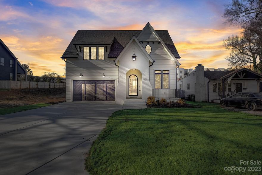 You can FEEL the warmer weather in this stunning newer construction w/resort-like backyard. Relax on your screened porch, overlooking the heated pool w/spa. This '22 THR build sits in booming Villa Heights, just blocks from the 25th light rail station & new development along Davidson & Brevard. There are knockout features at every turn, starting w/the metal & glass front door. Inside, a great room w/beams, built-ins & fireplace leads to the dining & kitchen. It has expansive cabinetry, stylish open shelving, a gas range, & separate prep area/butler's pantry. There's also a bedroom & full bath on the main. Upstairs has 4 more bedrooms, including the vaulted primary suite, which spans the width of the house. It has a luxurious bath w/separate vanities, soaking tub & shower, & customized walk-in closet. There's laundry w/added cabinetry for folding/hanging, plus a drop zone leading to the 2-car garage. Fully fenced backyard, with additional fencing around the pool. Welcome home!