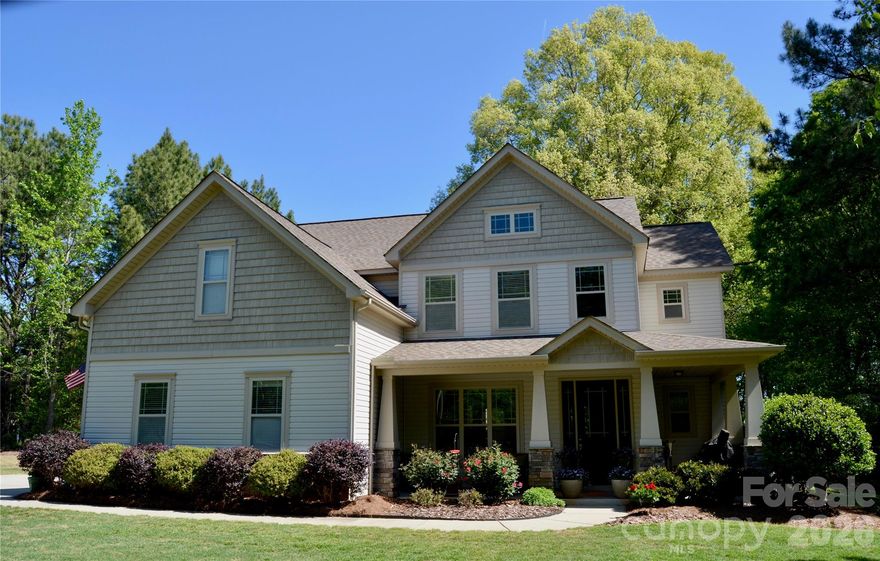 Beautiful and hard-to-find 3.13-acre wooded lot nestled in a quiet cul-de-sac, offering privacy, space, and flexibility.Enjoy peaceful mornings on the covered front porch surrounded by nature. Inside, the home features a thoughtfully designed layout, including a main-level in-law suite, perfect for multi-generational living or guests.
The heart of the home is the chef’s kitchen, showcasing a large granite island, granite countertops, and generous workspace—ideal for entertaining and everyday living. The spacious primary suite is a true retreat, featuring an oversized walk-in closet with custom shelving and a private sitting area overlooking the wooded backyard, creating a serene space to relax. The primary bath includes a well-designed tile shower with granite countertops, combining style and functionality. The home has been freshly painted, offering a clean, move-in-ready feel. A standout feature is the 30x40 detached building with slab and power, perfect for a workshop, storage, or hobbies. This rare property combines acreage, privacy, and versatility—an exceptional opportunity.