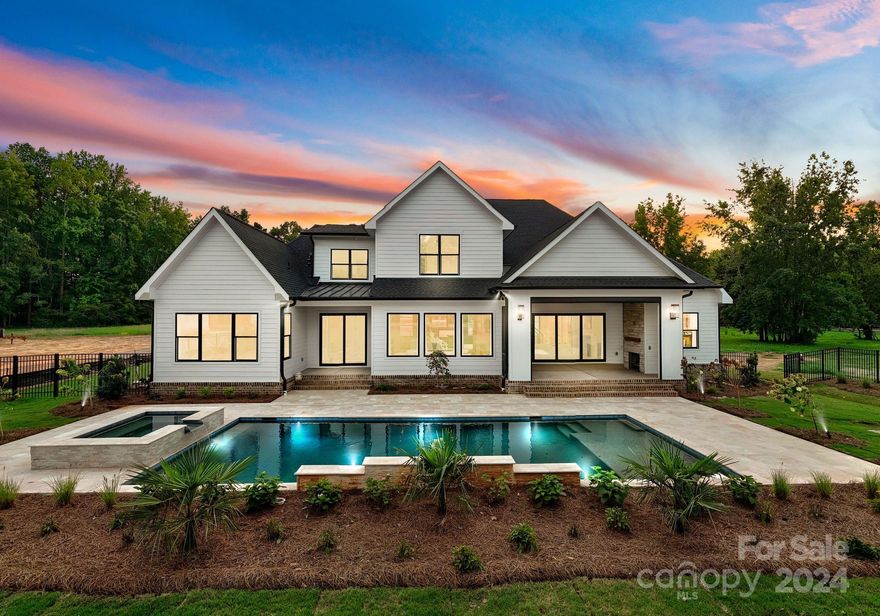 Enjoy luxury living on almost 1.5 acres & no HOA! This home, located in desirable Marvin School district & across from Firethorne Country Club, spans over 4,300 sf. It includes 4 bedrooms, 4 baths, study, bonus room, fitness room, and a retractable screened-in porch w/ fireplace. The kitchen features high-end Wolf, SubZero, & Cove appliances, including built-in coffee maker, under-cabinet ice maker, as well as custom cabinetry & a scullery with sink & beverage cooler. The interior is professionally designed with timeless high-end fixtures, intricate trim details, an enormous gas fireplace w/ custom Carrera marble surround, and a glass-enclosed wine room with refrigerated wine tower. Outdoors, you will find a custom in-ground pool & spa, and an expansive tree-lined backyard. The oversized 3-car garage provides ample space for all your toys. This is an exclusive opportunity to own one of 3 custom-built homes that offer all the amenities of community life w/out the constraints of an HOA.