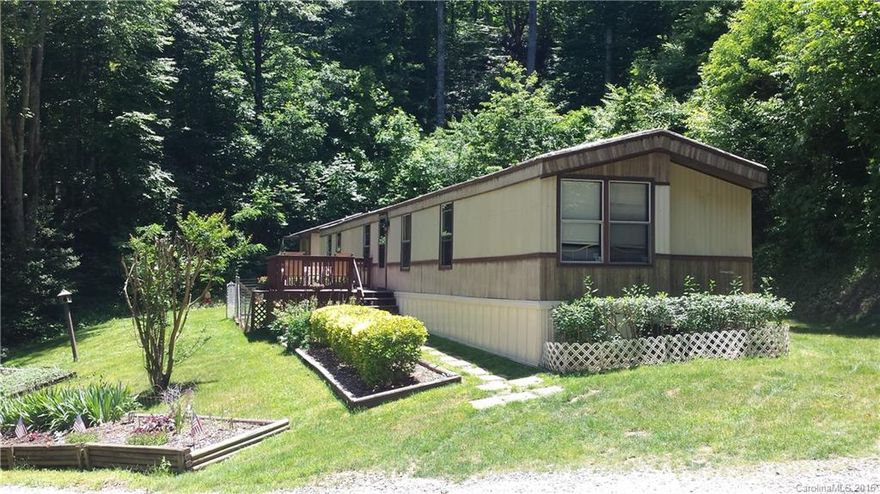 Located in a quiet neighborhood that's very secluded, yet only 15 minutes from downtown Asheville. This house is in great condition and the owners have planted gorgeous flowers on the property over the past 20 years. 2 bedrooms plus bonus room. Well maintained inside and out! Must see!!! Won't last long, priced to sell!!! Please allow at least one hour to show.