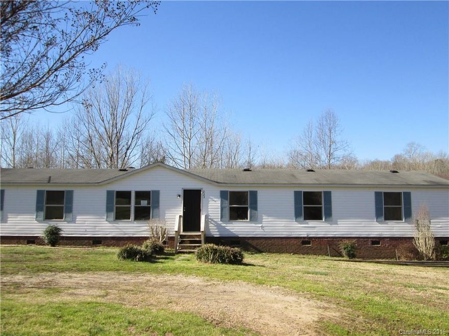 Spacious foreclosure. 4BR/2BA with new large deck, brick under pinning. Homes needs a lot - carpet, appliances, and more. Priced accordingly! New HVAC. Sold as is, where is.