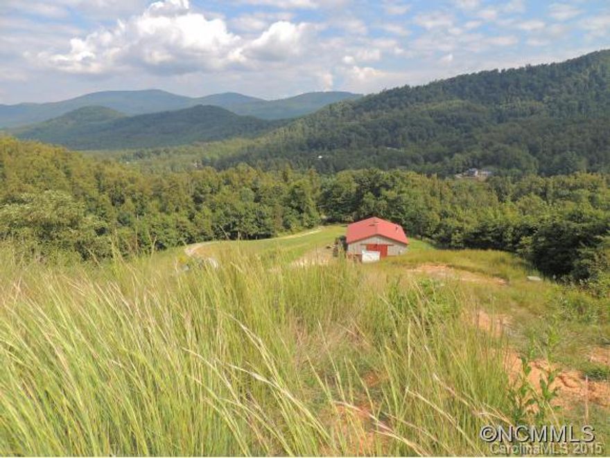 Beautiful Private acreage with Great Mountain Views, Streams and Pastures (some already fenced in) A very nice Morton Barn Structure with 5 horse stalls and a tack room.  (2) septic systems & Well are already in place to build your dream home on this  17.48 acres.  Only 20 minutes to downtown Asheville