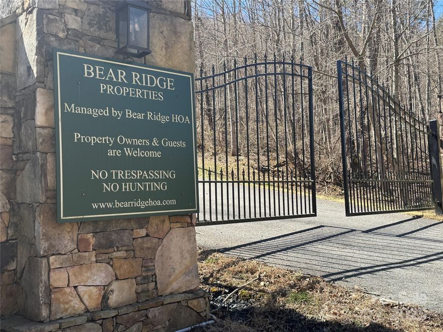 Nestled in a prime location offering both seclusion and privacy, this property is the perfect retreat for nature lovers and adventure seekers. Surrounded by stunning waterfalls, scenic trailheads, state parks, winding rivers, and expansive national forests, you're never far from your next outdoor escape. At over 3,000 feet elevation, you'll enjoy cool breezes, breathtaking mountain views, and a peaceful atmosphere year-round. When you're in the mood for a mountain adventure, Banner Elk and Sugar Mountain are just 35 miles away. Easily accessible via a well-maintained gravel road, the property is situated behind a secure gated entrance for added privacy and peace of mind. Little Rock Creek flows at the base of the development with a picnic shelter, adding to the tranquil ambiance of the area. Whether you're looking to build your dream home or invest in a future getaway, this lot offers endless possibilities. Development restrictions help protect the value and aesthetic of the community.