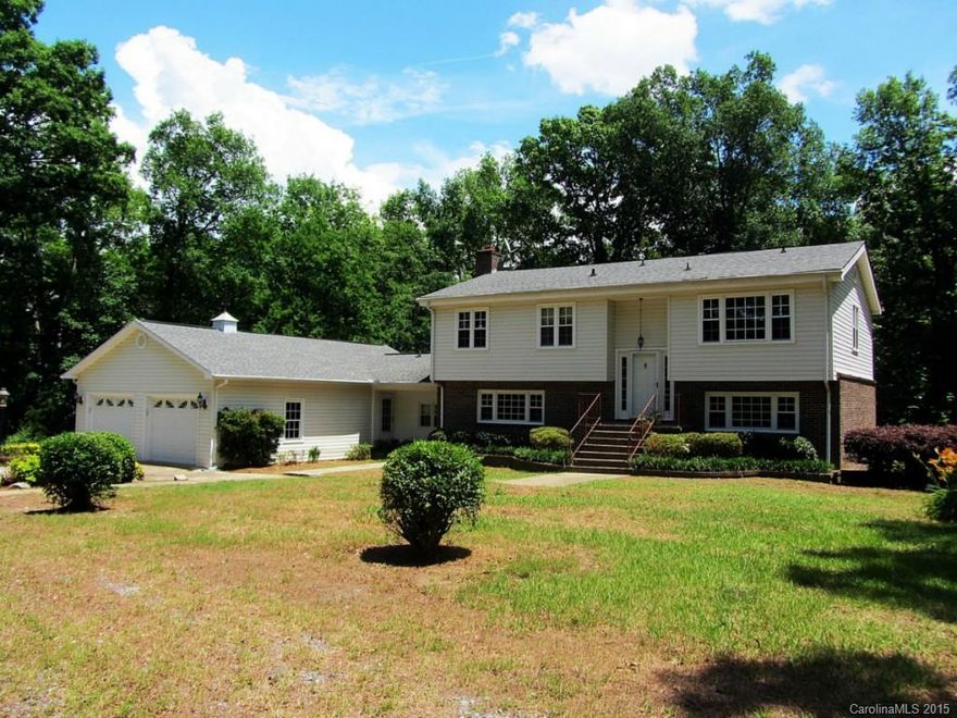Spacious 5 bedroom, 3.5 bath home on nearly 5 acres of land! Large deck overlooks peaceful wooded backyard.  Attached 2 car garage has storage space, perfect for a workshop, plus a full bath.  Eat-in kitchen, family room with fireplace, separate den and plenty of bedrooms. So much potential and everything you’ve been searching for! Strongly encouraged that offers include proof of funds/pre-approval & is required for seller's final acceptance.