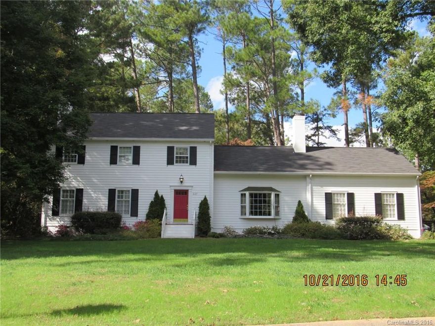 Room to grow in the lovely well maintained home. Two story with large master, fireplace and sitting area, extra storage in walk in attic, could be another room if needed. Beautiful hard wood floors, fireplace in den with bay window, laundry room with sink, and large garage with additional work space. Out side offers nice screened porch, lots of concrete area and nice landscaping. Additional corner lot is part of the price. This home is ready for  new owners to begin their new memories.