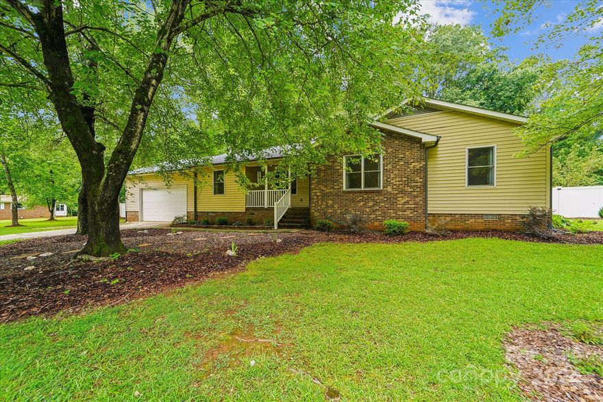 Stop looking you have found it! Renovated ranch home with attached 2 car garage sitting on a beautiful 1 acre lot in Rock Hill. This home is new everything, some features to notice as you tour this home are the new floors throughout, french doors, shiplap accent wall, great open floor plan perfect for entertaining with an eat in kitchen and tons of natural light with fresh neutral paint colors.If you love cooking you will be in heaven with this custom kitchen space, granite countertops, all new appliances and an oversized prep station with ample drawer storage!  Both bathrooms have been updated, the primary features a with walk in shower, and dual vanity. Think the updates are done, not even close, step outside to enjoy a privacy fenced backyard, new deck, solar lights, fruit trees including peaches and evergreens along the edge of your property. Plus we added a whole home water purifying system. This home is a must see!