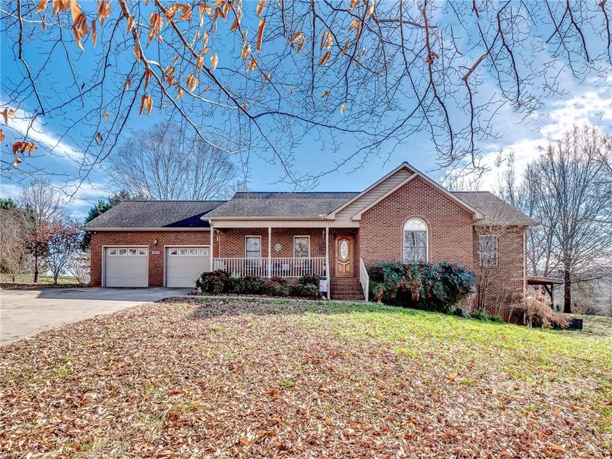 Serene, country living in the desirable West Rowan District! Enjoy privacy and space in this FULL BRICK, one story basement home on OVER .75 ACRE!!! So many spots to relax and unwind including fenced yard with back deck, oversized side patio along with the covered front porch! You will love the two car garage along with extra driveway space for parking! Enjoy the winter days cozied up in front of the gas logs in the spacious living room. Entry to the basement from interior. Turn the unfinished basement into a space that fits your needs! Home gym, man cave, or even a separate living quarters as it already has a bathroom installed! NEW HVAC UNIT just installed in Dec. 2022!