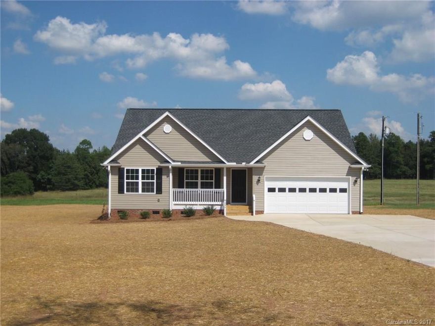 Come to the country and live in this new construction vinyl siding ranch w/ split bedroom plan, Kitchen w/ granite, pantry & laminate flooring, Breakfast area w/ laminate flooring, Vaulted family room w/ laminate flooring, Covered back porch, 2.31 Acre Lot