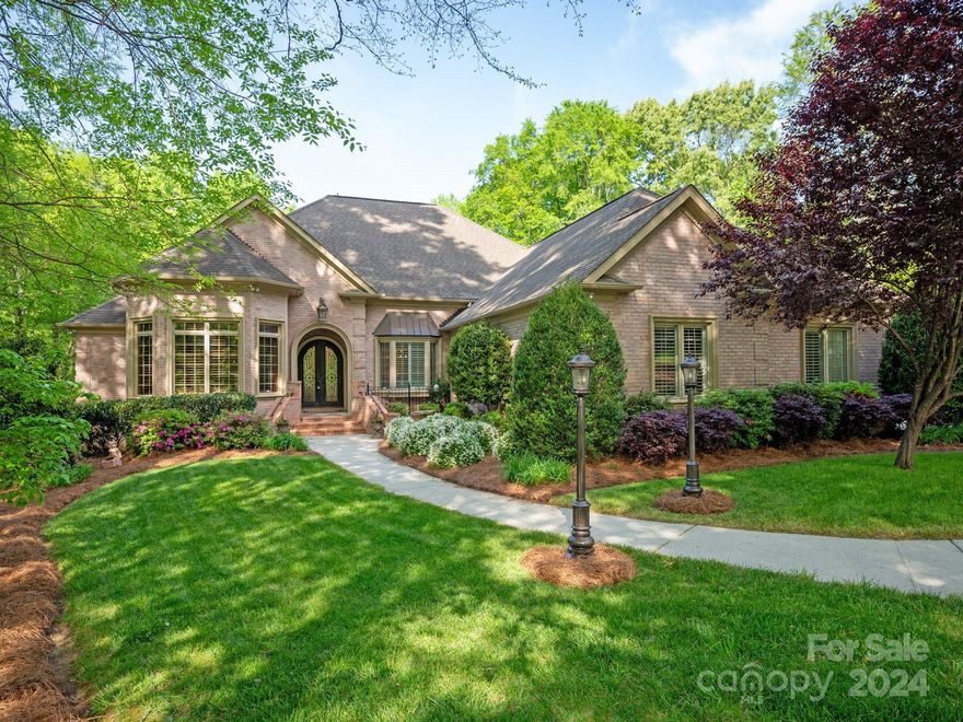 HIGHEST AND BEST by Sunday at 3:00pm. Lovely hard to find 1.5 story custom home in popular gated Providence Downs community! Floor plan includes a primary on main with gorgeous remodeled attached bath w/large tiled shower & frameless door + rain shower head and separate stand alone tub. Main floor also includes a luxury wood paneled private office w/beautiful built ins & coffered ceiling, luxurious Great Room with 10+ ceiling, a cozy keeping space + 3 additional bedrooms & 2 full baths. Upstairs features an additional bedroom w/full bath, a flex space perfect for your gym equipment + a large 280sf bonus room! Kitchen includes a great appliance package with Thermador gas cooktop, warming drawer, commercial hood, double ovens, trash compactor + pot filler faucet. Take in the amazing Carolina weather from either the screened in porch w/EZ Breeze windows, or the amazing fully fenced backyard w/extended paver patio, putting green & lovely pergola.