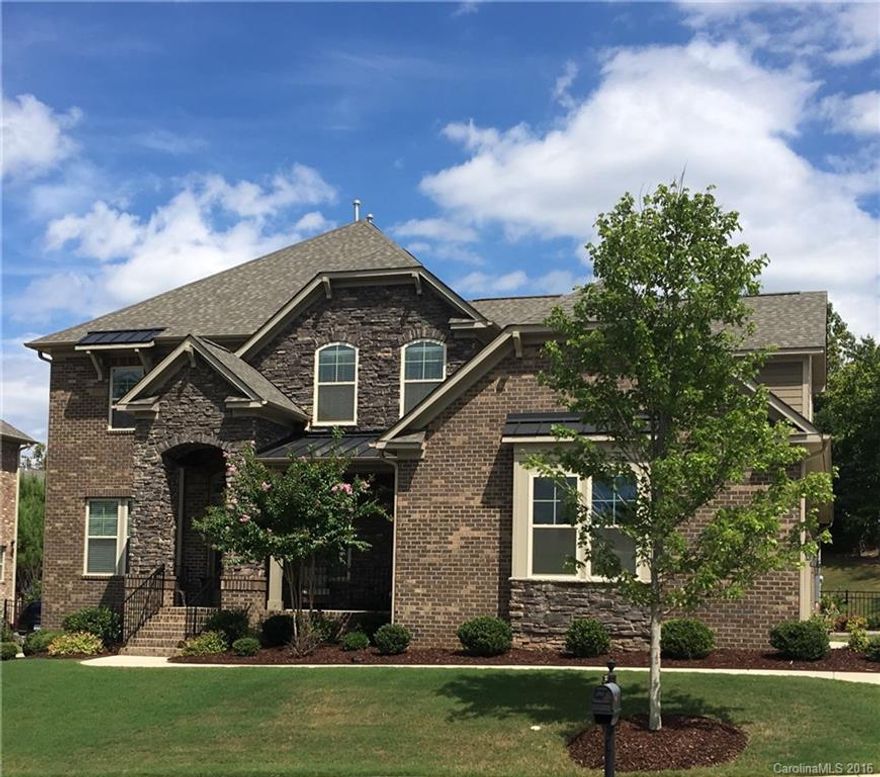 Beautiful grand brick home in Eagle's Landing in The Palisades. Practically new home with all of the upgrades from the Eastover plan. First floor master suite, open kitchen with breakfast area, open family room floor plan, laundry room, formal dining room , formal living room, half bath. Second floor features 4 additional bedrooms, large loft area for extra space. 3 car side load garage Gorgeous outdoor terrace for entertaining. fire-pit area with private tree lined backyard.