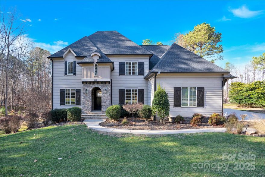 This 5-bedroom custom home offers Lake Norman views on a .90-acre lot in The Farms. The open main level is perfect for entertaining, featuring a chef’s kitchen with a large island, Sub-Zero refrigerator, Wolf appliances, butler’s pantry, plus two powder rooms and a main-level office.
Upstairs, the primary suite is privately set apart, with three additional bedrooms, each with ensuite bathrooms, plus a bonus room.
The finished lower level features a stone fireplace, wet bar, beverage refrigerator, dishwasher, and space for a full-size refrigerator. A fifth bedroom with a full bath and ample storage complete this level. Electric car charging station in garage.
Enjoy lake views from the covered porch or patio, or relax by the fire pit. With the septic system across the street, there’s room for a pool! Recent updates include a new roof (2024) and an encapsulated crawl space.
Don’t miss this rare opportunity for luxury lake living!
Listing agent is the owner.