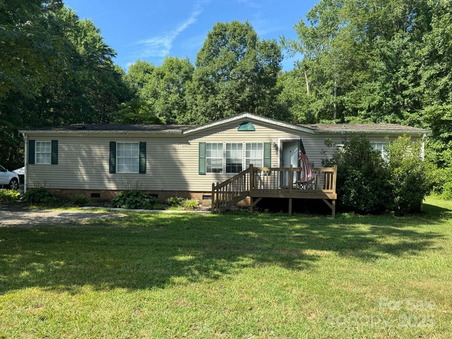 Conveniently located near the NC/SC state line, this 3-bedroom, 2-bath manufactured home offers quick access to Gastonia amenities while providing a quiet, country setting. The home features a split-bedroom layout, an open living area, and a spacious kitchen. Perfect for investors or buyers looking for immediate rental income—currently tenant occupied on a month-to-month lease. Please do not disturb tenants.