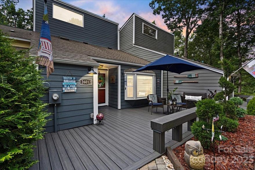 **Price reposition** Looking for a boat slip in Tega Cay?  Here's your chance at one! Come home to this beautifully updated and meticulously maintained townhome in the Tega Cay peninsula.  This 3 bedroom 3 bath home was recently expanded and has an open concept main living space. Plenty of room to entertain with the beautiful kitchen, family room and bar area.  Dine al-fresco under your gazebo on the deck.  There is a guest room and full bath on main.  Upstairs enjoy your recently expanded primary bedroom with a separate seating area and en-suite.  A secondary bedroom and laundry are upstairs.  Many features to enjoy including the Bamboo flooring downstairs and LVP upstairs as well as plenty of storage space.  Live the lake life year round with a shared dock. Low monthly HOA. Come see the tree lined drive to your new home where you can enjoy and Fort Mill Schools.  You're gonna love it here!