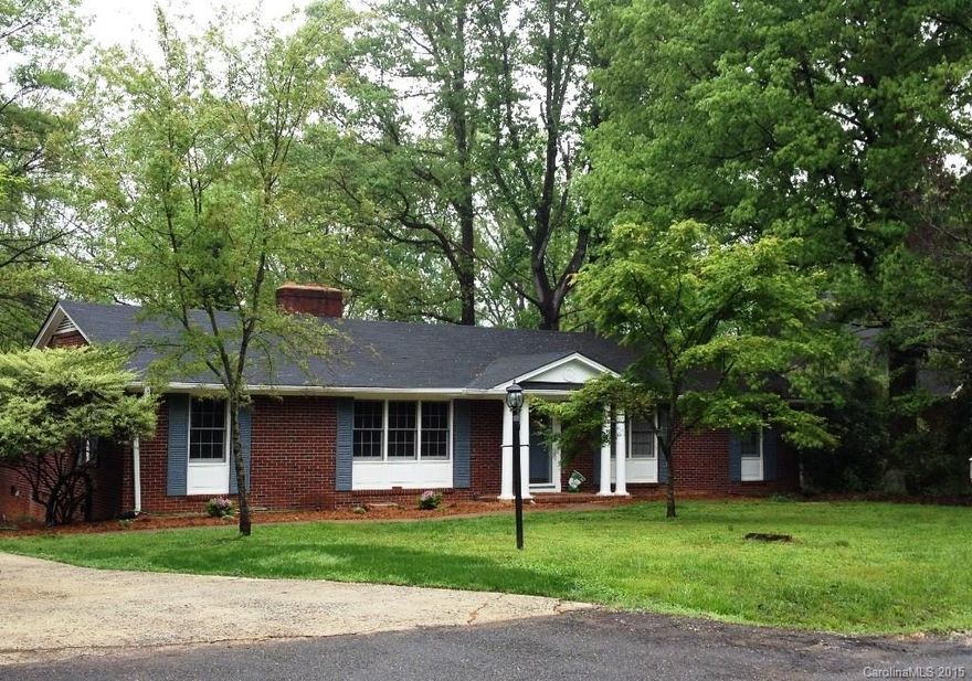 Charming and spacious brick Ranch in one of Rock Hill’s favorite neighborhoods!  Formals, hardwoods, updated kitchen and bathrooms, huge laundry, two fireplaces, and lovely wooded lot make this a move in ready home!  Huge rec/bonus room has many, many possibilities.  County taxes with city location – so convenient to everything!