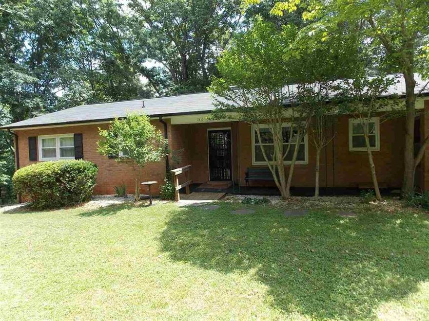 Lots of house! 3BR, 2BA brick ranch with 2 car garage and laundry on main level. Living room has gas log fireplace and sliding doors that leald to an outside deck. Full basement. Very private.