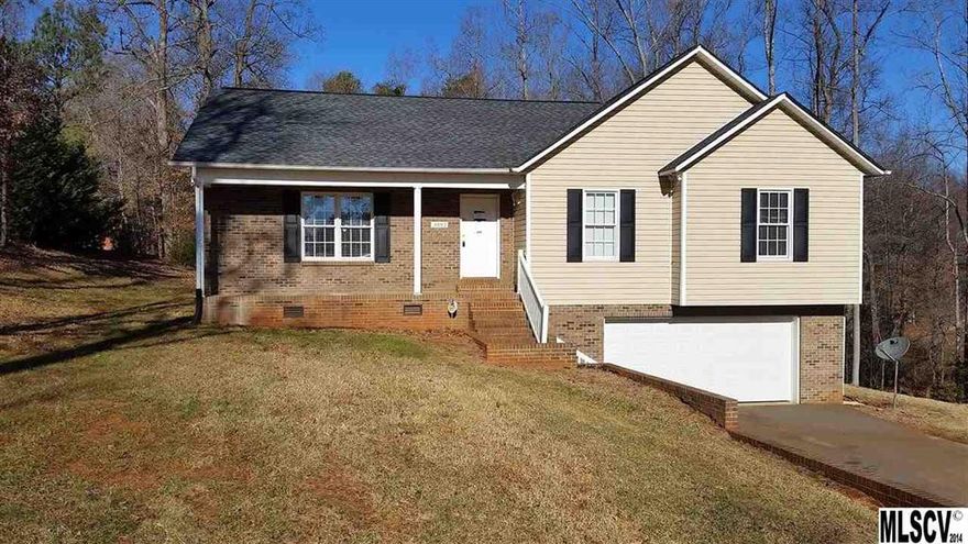 Perfect for first time home buyer this home features 3 bedrooms and 2 baths, open kitchen to living room with hardwood floors, and oversized 2 car garage in the basement. Home sits on  large, private lot. Priced well under tax value and in move in condition.
