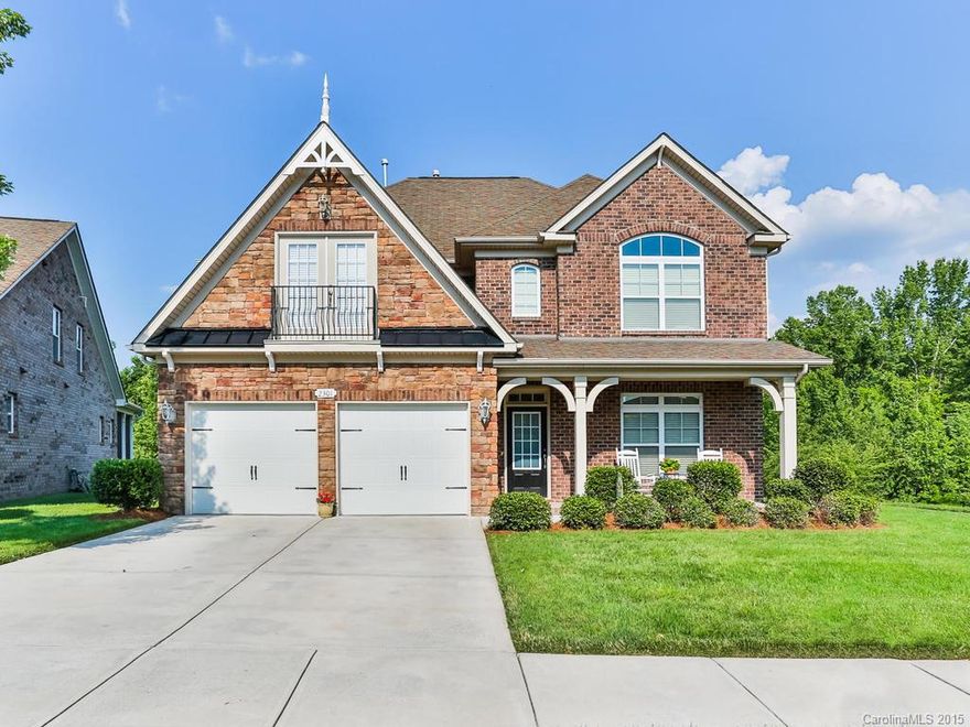 Meticulously cared for 1 owner full brick home on prime lot backing to natural area! Professionally painted w/neutral colors throughout. Wrought Iron Spindles on Stairs. Upgraded raised panel cabinets & granite counters in kitchen & baths. Upgraded lighting! Tons of crown molding! Hardwoods throughout most of main level. Convenient full bed and bath on 1st floor! Cozy great room w/gas fireplace. Baths and laundry w/upgraded tile!Popular neighborhood w/first class amenities. Top rated schools.