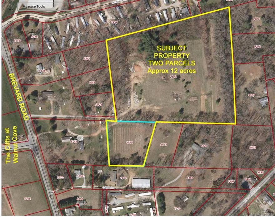 Excellent Residential or Multi-Family Development location.  Located across from the Main Entrance road to The Cliffs at Walnut Cove.  This is an assemblage of tracts for approx 15.43ac.  Zoned in Buncombe County R-2.  More property available on the frontage for commercial use.  Entrance Road TBD.  VILLAS AT AVERY CREEK