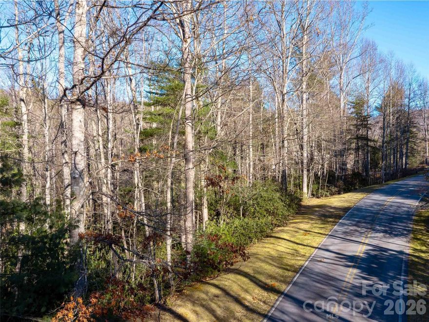 Beautiful wooded and gently sloped building lot in Champion Hills, Hendersonville’s premier private golf club community on Tom Fazio’s signature course. This private .76-acre wooded lot offers a gentle slope, ideal for creating your dream home and mountain getaway, among mature hardwoods, mountain laurel and rhododendrons.  With its miles of hiking trails, and exclusive amenities including private golf course, clubhouse, pool, tennis, wellness center, and upscale or casual dining, you’re going to love our community!