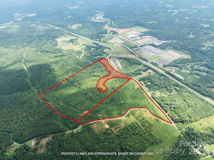 Don’t miss this exceptional 128-acre development opportunity with outstanding visibility along Highway 74 and an ideal location only 0.5 miles from Tryon International Equestrian Center! The property has been largely cleared and showcases panoramic mountain views, making it perfectly suited for a wide range of residential or commercial projects. Featuring an estimated 2,000 feet of frontage along Pea Ridge Road, the site also offers approximately 20 acres set aside for future commercial use. Its strategic position sits directly across Highway 74 from the new 96-room hotel, underscoring the tremendous growth and investment momentum in the area. With its combination of prime location, versatile land use potential, and proximity to major regional amenities, this property represents a rare chance to secure a large-scale site in one of the region’s fastest-growing corridors.
