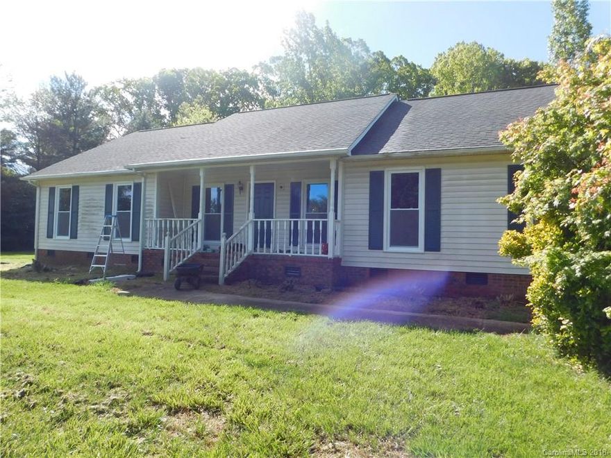 3 Bed/2 Bath Ranch on an Acre w/an Deck & Hot Tub. Open Floor Split Bedroom Floor Plan w/Valuted Ceiling, Wet Bar & Wood Burning Fireplace in Great Rm.   Eat In Kitchen w/ New French Door Leading to Deck & Hot Tub.  Located in the County!