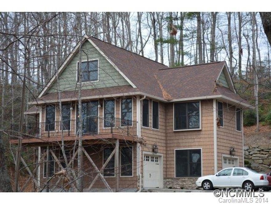 Like new construction with open floor plan and great views.  No expense spared in this dream house. 2 Bedroom septic, but 3rd bedroom on the 2nd level  Lower level offers storage galore and could easily be made into a family room.  Ample decking to enjoy the views... and space to grow on your 2.24 acres site.