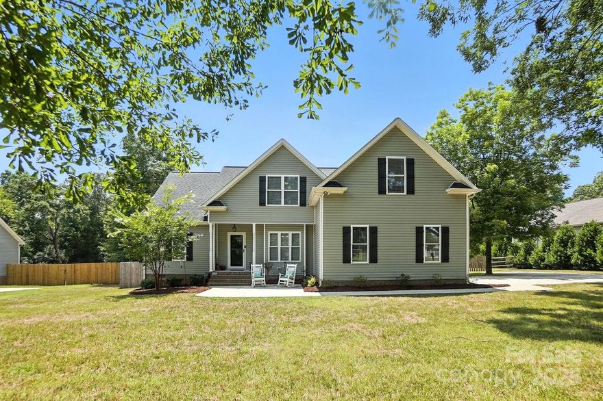 Seller Credit of $7,500 towards rate buy down or CC with acceptable offer. Welcome to 197 Ormand Road in York, SC, a custom-built 1.5-story home perfectly blending comfort, function, and outdoor living on a private 1-acre lot. Meticulously maintained and thoughtfully designed, this split-level floor plan sits on a dead-end street with no HOA, offering peace, privacy, and plenty of space. Zoned for the award-winning Clover School District, this property checks all the boxes inside and out. Inside, you’ll find a bright open floor plan filled with natural light, a formal dining room, and a separate dining area. The kitchen features counter seating, ample cabinetry, and seamless flow into the living and dining spaces. The primary suite is a retreat of its own with a tray ceiling, spacious closet, and en-suite bath featuring double vanities, a garden tub, and a separate shower. Two additional bedrooms and a full bath complete the main level. Upstairs offers the perfect flexible living space with a bedroom, full bath, and a spacious loft that could serve as a second living area, guest suite, or bonus room. The full-size attic provides exceptional storage with potential to be finished for additional use. The true showstopper is the backyard oasis. Step outside to your own resort-style escape featuring a stunning heated pool with a connected hot tub, surrounded by elegant travertine concrete decking that stays cool underfoot. The pool area is perfectly designed for both relaxation and fun. Enjoy lounging in the sun or taking a swim. Just steps away, a gorgeous deck overlooks the pool, offering the perfect spot for grilling, entertaining, or unwinding after a long day. The fenced backyard provides privacy, while the extended driveway allows for plenty of additional parking. With 4 bedrooms, 3 full baths, a 2-car side-load garage, and multiple versatile living spaces, this home is ready to fit your lifestyle. Whether you’re entertaining friends, hosting family, or simply enjoying the quiet surroundings, 197 Ormand Road offers it all. Schedule your showing today and experience this exceptional home!