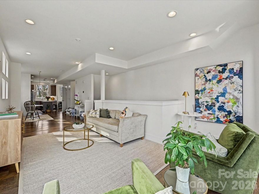 Welcome Home to your unique, modern 4 story townhome with an amazing Roof Top Terrace that boasts skyline vistas, perfect for entertaining or relaxing under the Charlotte sky.
This duet style townhome in the coveted Seversville community offering contemporary living just moments from Uptown Charlotte. Open concept layout includes large, upgraded kitchen, dining area & living room with balcony. Kitchen includes SS Appliances, Gas Range, European Style Cabinets & Quartz Countertops. This home features natural light throughout & pre-finished wood floors throughout the entire unit. Main Level also has home office area with desk & window overlooking the backyard. The upper level boasts a spacious primary bedroom. The primary bathroom includes large tile shower, dual sink vanity & walk-in closet.
The secondary bedroom has an upgraded full bath and sliding door open to outside. Enjoy grilling with connected gas line or relax watching tv on the rooftop terrace. 2 car tandem garage is oversized, with storage closet and access to fenced backyard.